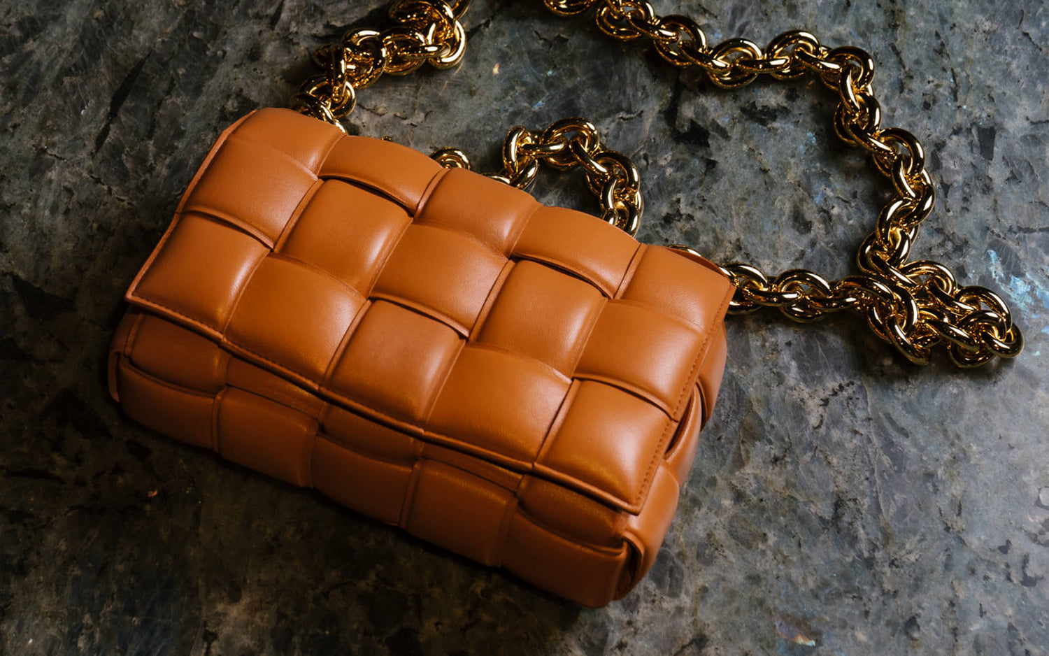 Bottega Veneta-style woven cassette bag in caramel leather